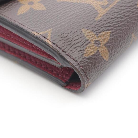 LOUIS VUITTON Brown Monogram Leather Wallet - Picture 10 of 10